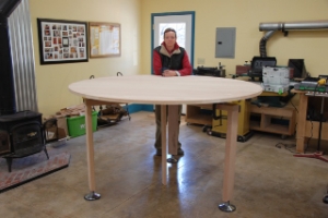 Monica and table in the shop.
